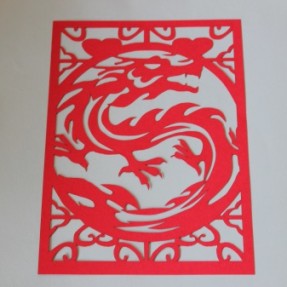 Laser paper cutting – red dragon cutting
